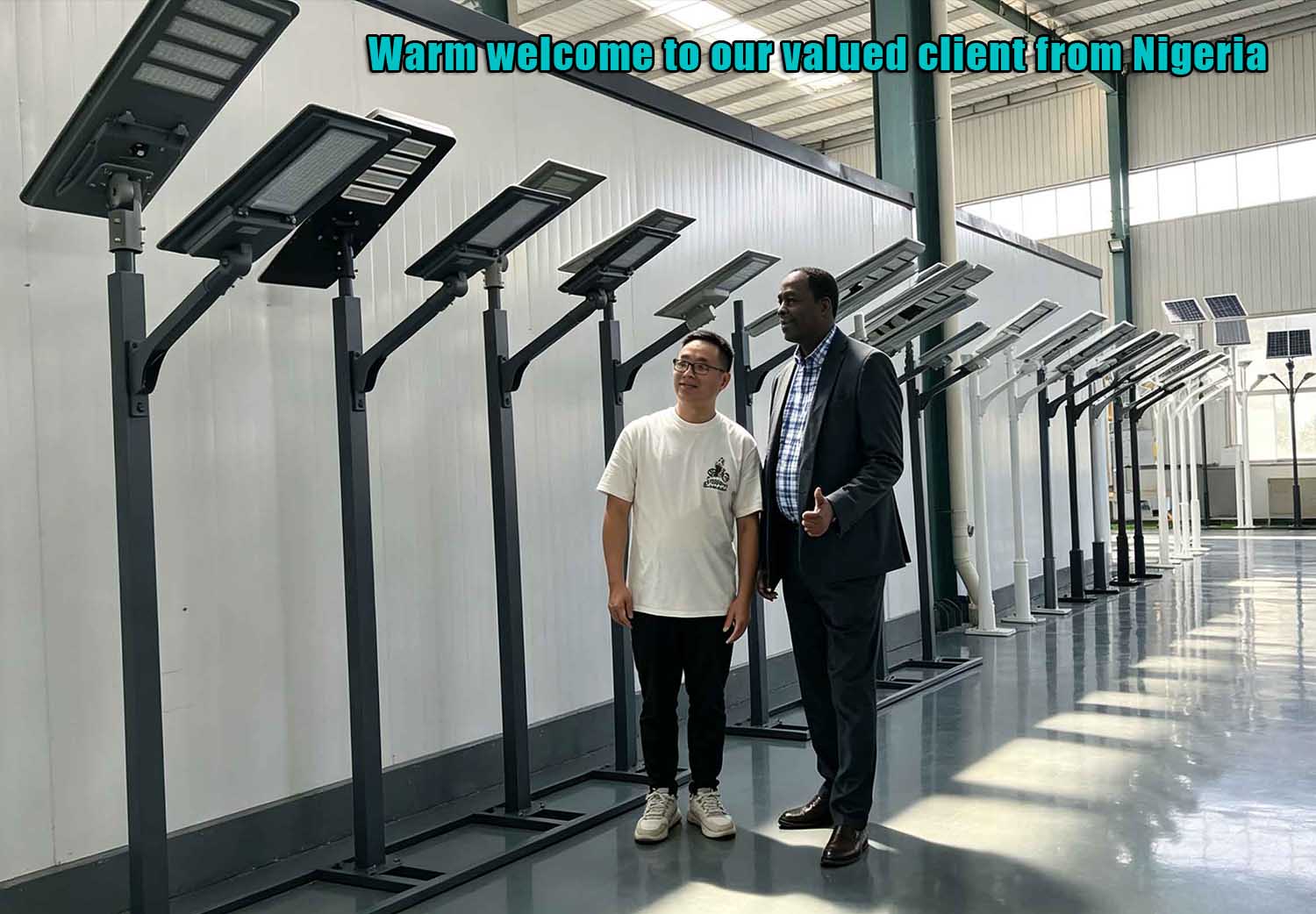 Warm welcome to our valued client from Nigeria our guest toured our showroom, solar light displays and solar‑panel exhibition area